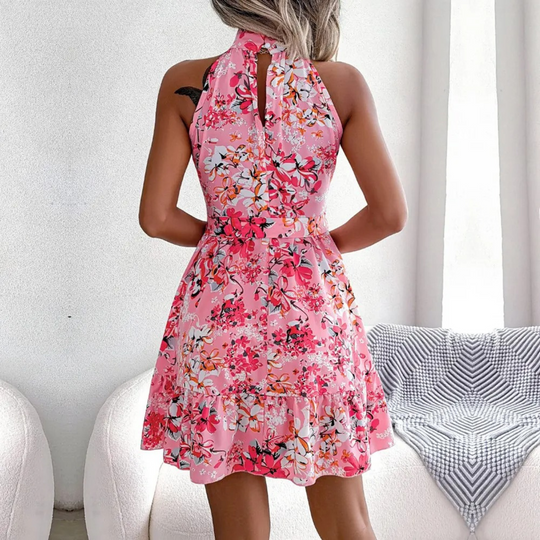 Sommarminiklänning - blommönstrad halterneck med flödande kjolar och bandbälte