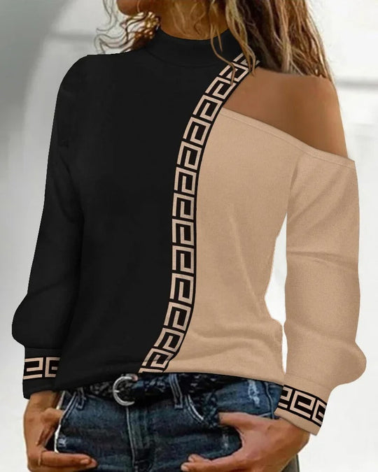 Lova svart damblus med patchworkmönster
