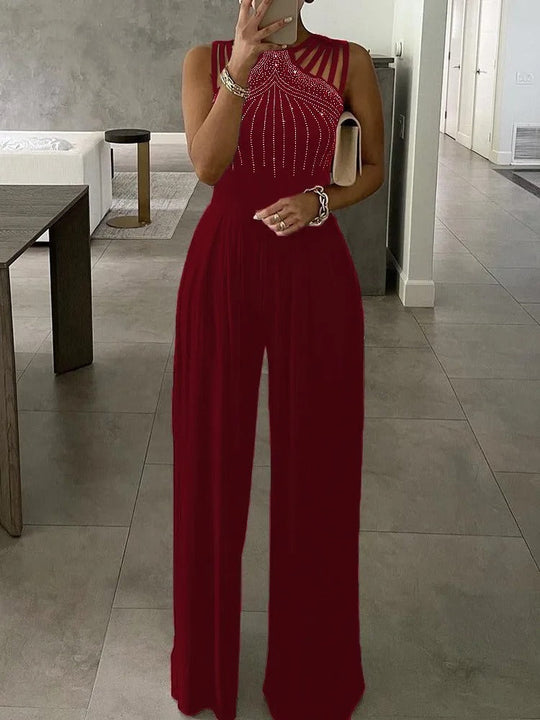 Ärmlös jumpsuit med blått diamantmönster och vida ben