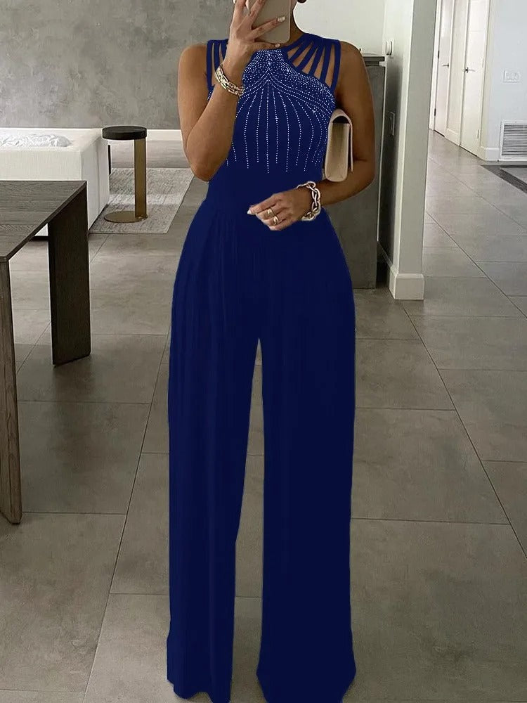 Ärmlös jumpsuit med blått diamantmönster och vida ben