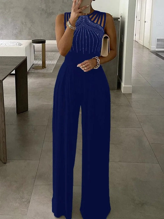 Ärmlös jumpsuit med blått diamantmönster och vida ben