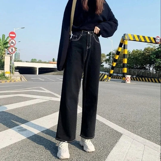 Baggy damjeans med krämsömmar