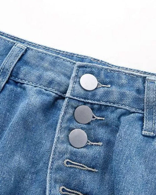 Slitna jeans med låg midja och knappar