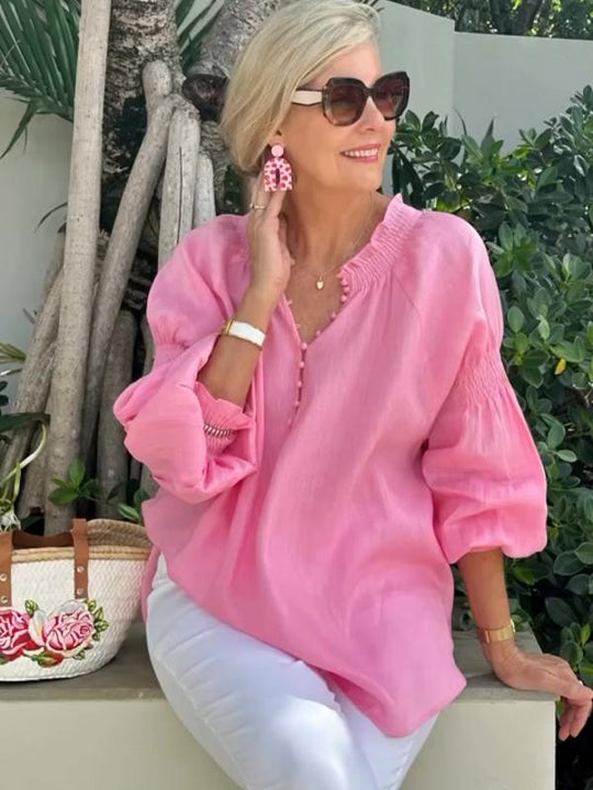V-ringad topp med lång puffärm för kvinnor med mångsidig look