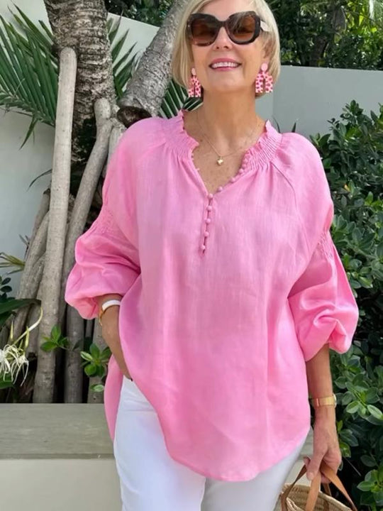 V-ringad topp med lång puffärm för kvinnor med mångsidig look