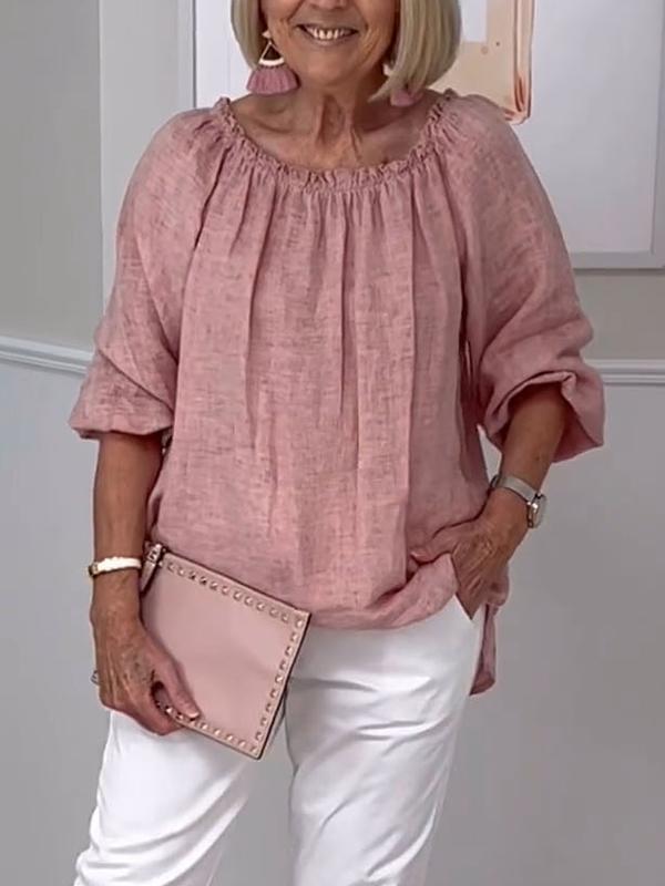 Elegant rundhalsad blus för kvinnor med medellånga ärmar