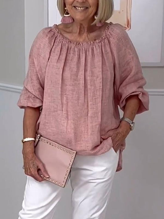 Elegant rundhalsad blus för kvinnor med medellånga ärmar