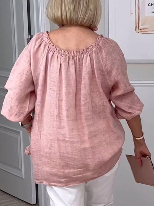 Elegant rundhalsad blus för kvinnor med medellånga ärmar