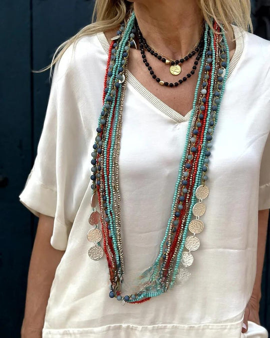 Elegant enfärgat set med blus och byxor