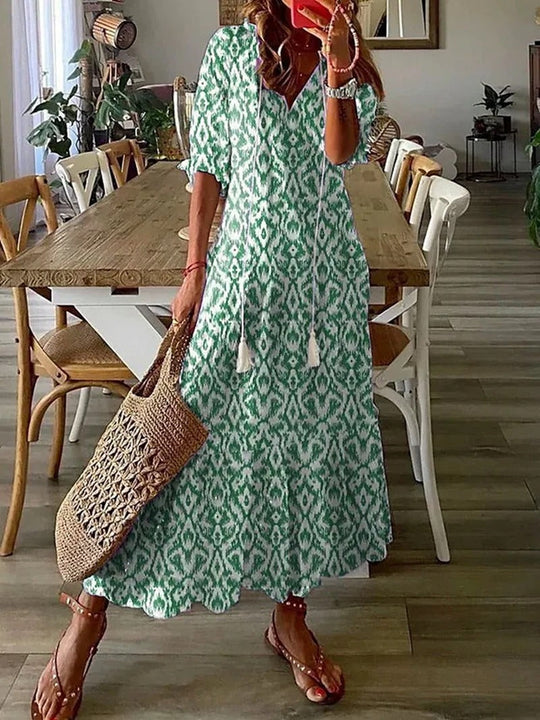 Lång bohemisk klänning för en bekväm sommarkänsla